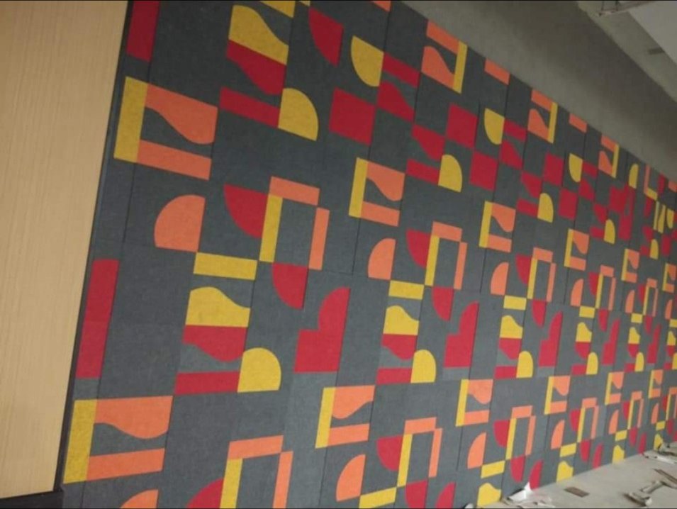 Acoustic panels arranged in a geometric pattern